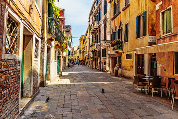 Fototapeta na wymiar Narrow street in the old town in Venice Italy