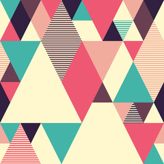 Geometric seamless pattern with colored triangles.