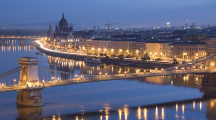 Fototapeta na wymiar Beautiful panorama of bridge and building Parliament in Budapest in twilight time, Hungary
