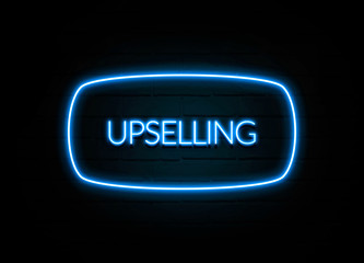 Upselling  - colorful Neon Sign on brickwall