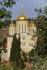 Fototapeta na wymiar A view of the Church of All Saints in the land of the Russian people who shone on the territory of the Gornensky Monastery in Jerusalem. Israel.