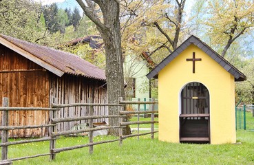 Obraz premium Austria Chapel with a Barn