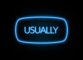 Usually  - colorful Neon Sign on brickwall