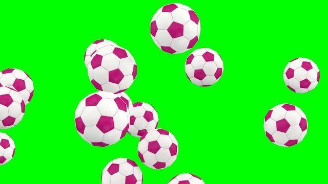 Animated simple soccer balls with white and pink material dancing, flying or jumping against green background and in slow motion. Close up shot and front camera view