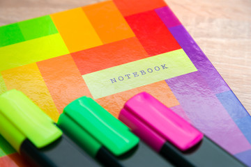 Bright notepad with markers