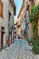 Fototapeta na wymiar Narrow cobbled streets in the old village Lyuseram, France