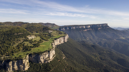 Fototapeta premium Aerial view of sheer cliffs near Rupit in Catalonia
