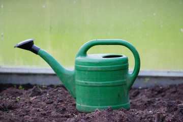 Outdoor photography of a watering can