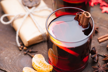 Hot mulled wine with spices and gift box 