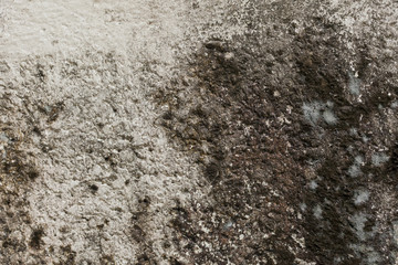 The surface of the wall is dirty.