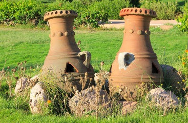 Old vintage vases and stones