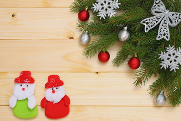 Christmas background. Top view with copy space. fir tree on light wooden background