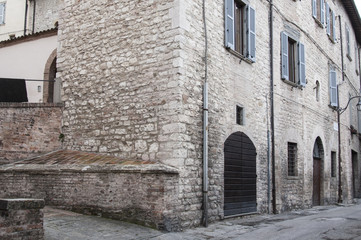 Fototapeta na wymiar Gubbio, Perugia, Italy - small typical street of the Gubbio village.