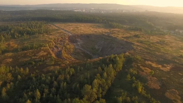 Aerial view of huge landslide near mining of potassium ore, deep hole in soil, Stebnyk, Truskavets, Ukraine