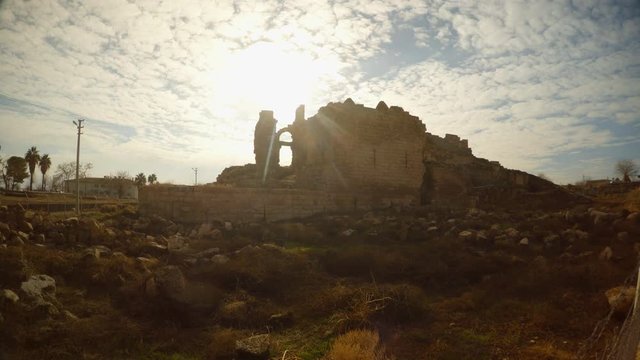 a wasteland in front of the border between Turkey and Syria