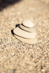 Fototapeta na wymiar A pile of pebbles on the sand