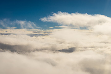 sunny sky above the clouds