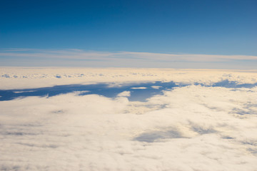Fototapeta na wymiar sunny sky above the clouds