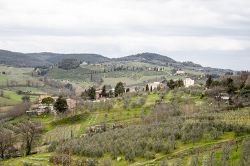 San Gimignano,  Siena, Italia - San Gimignano is a small walled medieval hill town. Known as the Town of Fine Towers, famous and unique for a dozen of tower houses,  "an unforgettable skyline".