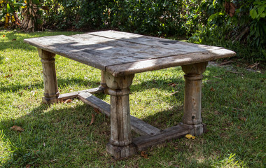 Naklejka premium Wooden distressed dining table outdoor furniture