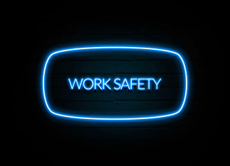 Work Safety  - colorful Neon Sign on brickwall