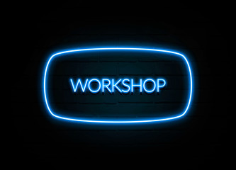 Workshop  - colorful Neon Sign on brickwall