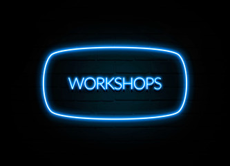 Workshops  - colorful Neon Sign on brickwall
