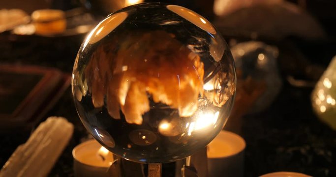 Clairvoyant mystic with crystal ball astrology reading
