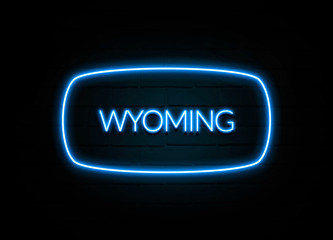 Wyoming  - colorful Neon Sign on brickwall