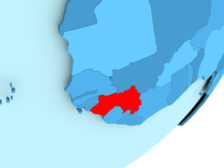 Map of Guinea on blue political globe