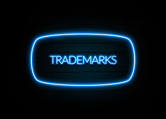 Trademarks  - colorful Neon Sign on brickwall