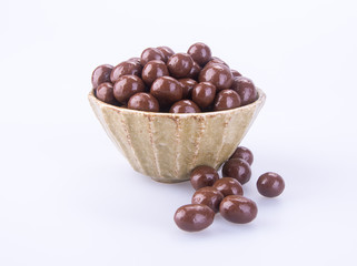 chocolate balls. chocolate balls in bowl on a background