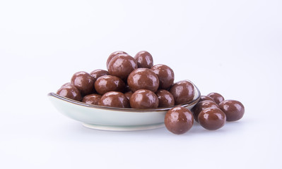 chocolate balls. chocolate balls in bowl on a background