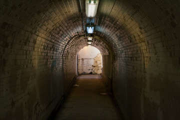 Old Tiled Tunnel with Fluorescent Lights