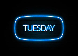Tuesday  - colorful Neon Sign on brickwall