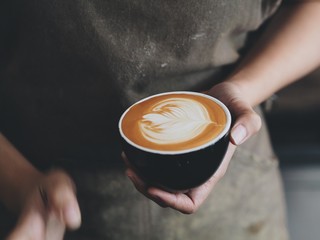 coffee latte art in cafe.