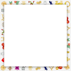 frame made of christmas decoration on snowy background