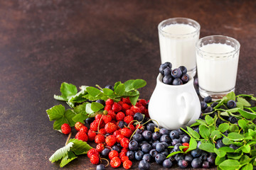 Forest berries and milk. Selective focus