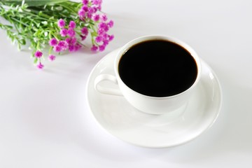 Black Coffee and Pink Flower isolated on white background