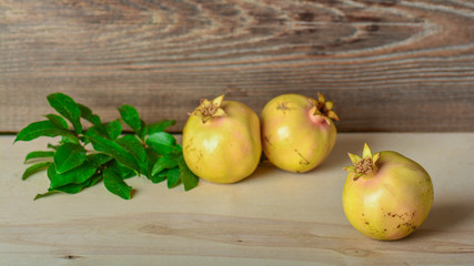Pomegranate on wooden background