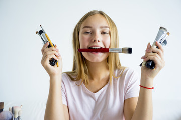 Girl applying makeup