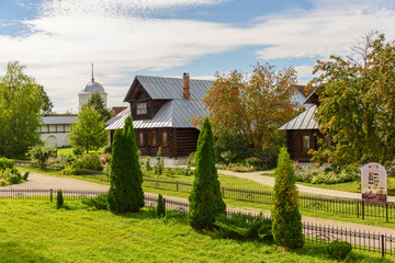 View of old wooden houses in Suzdal city. Russia. Home for nuns in an ancient monastery.