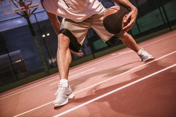 Naklejka premium Handsome basketball player