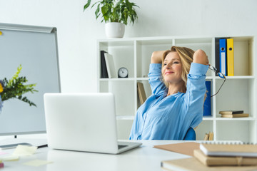 Fototapeta premium happy businesswoman with laptop