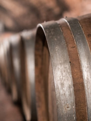 Wine barrels in row close up