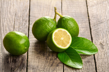 Juicy lime on a wooden background