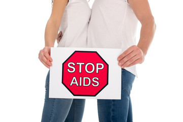 Fototapeta na wymiar couple with stop aids banner