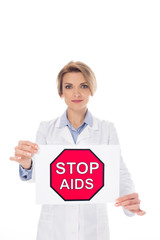 doctor with stop aids placard
