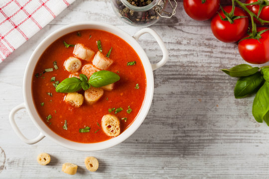 Traditional tomato soup, served with croutons.
