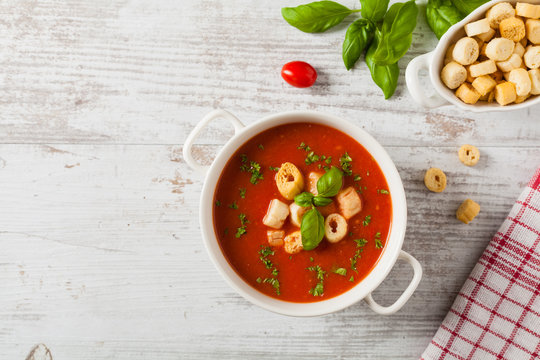 Traditional tomato soup, served with croutons.